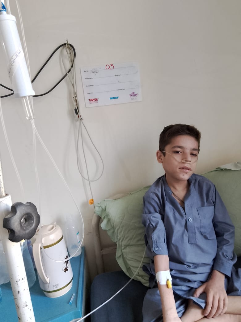 Ijlal undergoing a checkup