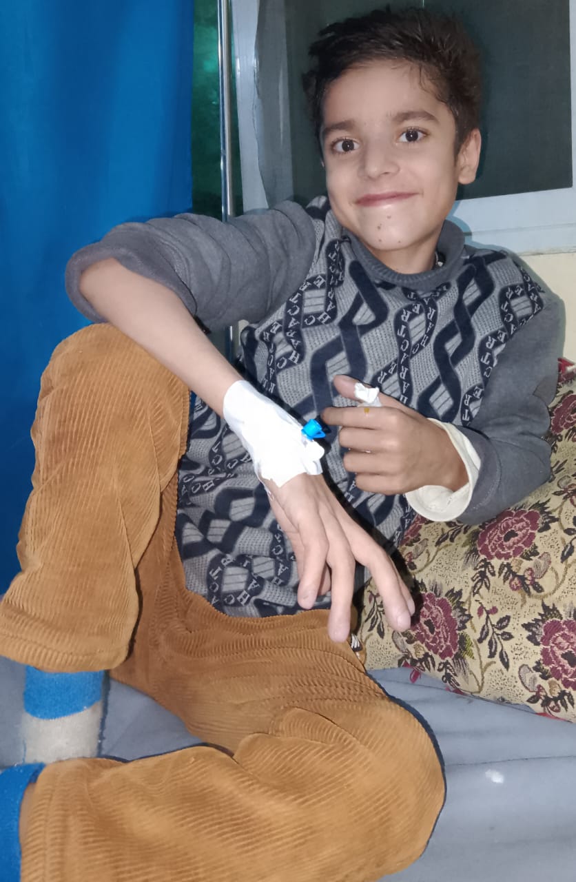 Ijlal resting in a hospital bed