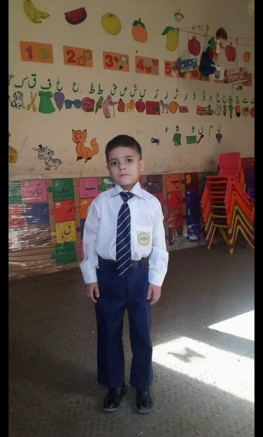Ijlal in his school uniform